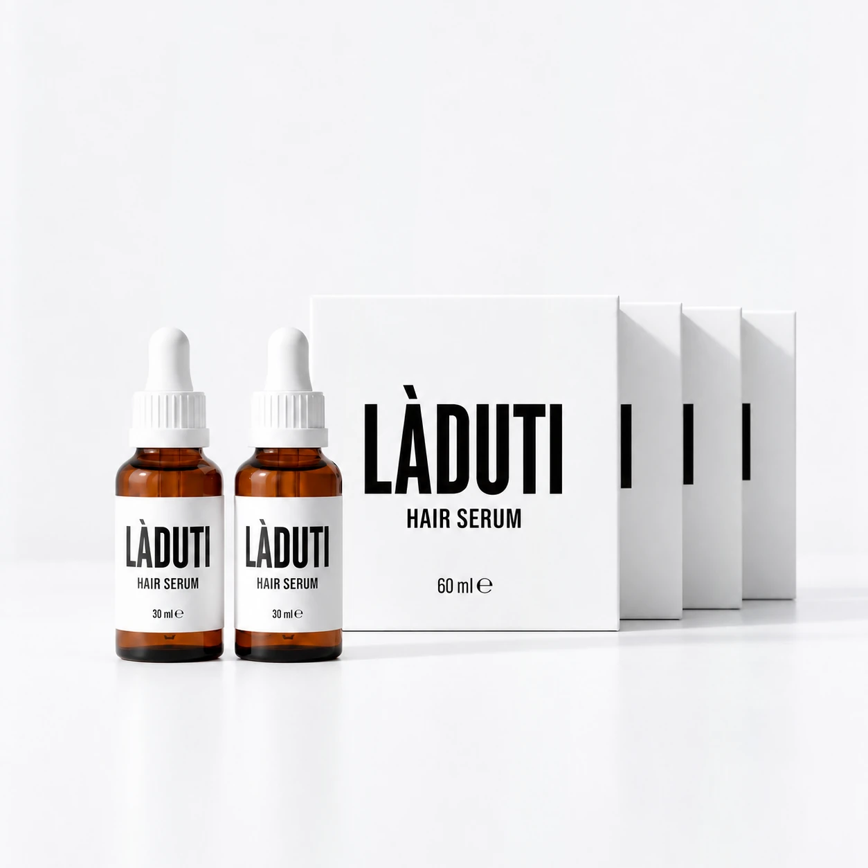 Laduti Hair Serum: zwei Flaschen vor vier Packungen